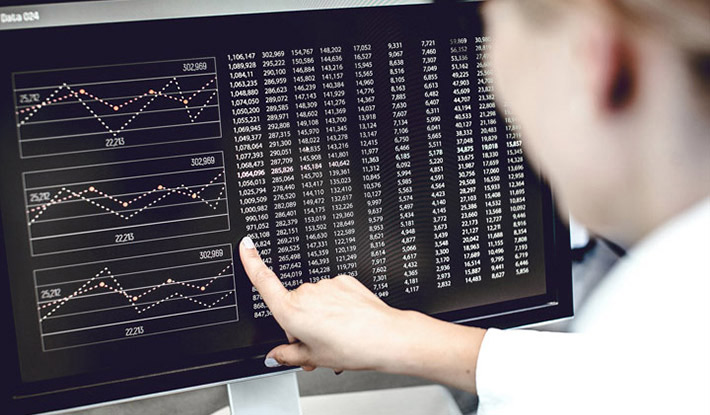 Person reading stats on display screen
